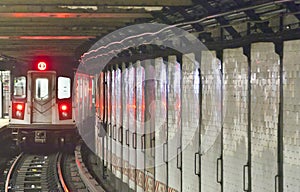 Train arrives in the underground station, New York