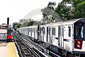 Train arriving at Mets - Willets Point train station. Transportation and City concept. New York City. United States