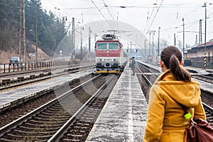 Train is arriving into the railway station of Ruzomberok, Slovak