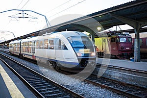 Train arriving in station photo