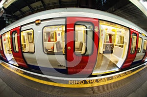 Train arriving at subway station in London, UK