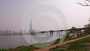 Train on Bridge across Hun River, Seoul panorama, Sauth Korea