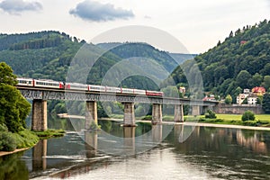 Train bridge crossing the Elbe River, Bad Schandau - Saxon Switzerland photo