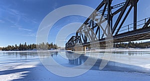 Train Bridge at Exshaw Reflection