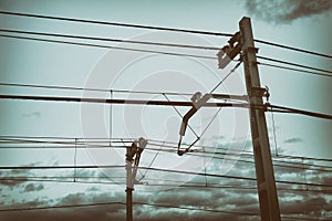 Train cable catenary and poles with vintage filter