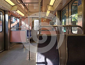 Interior view of an empty train car in Athens, Greece.