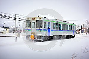 Train car passing through Asahikawa, Hokkaido, Japan photo