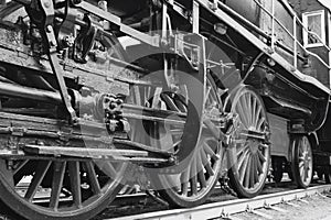 Train close up. Wheels of the train. The old train. Black and white photo