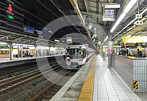 The train coming to station in Takayama, Japan