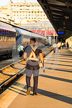 Train crew man doing checkings on the platform at the Bucharest North Railway Station in Bucharest, Romania, 2020