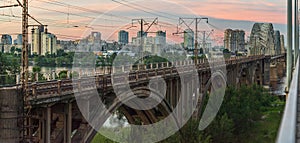 Train crosses the old bridge over the Dnieper river, Kiev, Ukraine