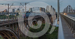 Train crosses the old bridge over the Dnieper river, Kiev, Ukraine