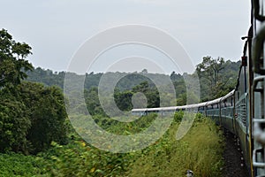 A train crossing through beautiful mountain railroad
