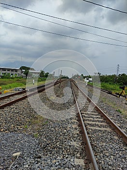 Train crossing and clouds