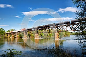 A train crossing a trestle over the Catawba river.