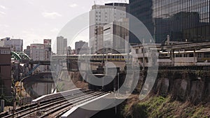 Train Departs Ochanomizu Station in Tokyo Japan, 4k