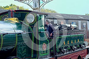 Steam train & driver. Blue Bell Railway Line, Sussex, UK