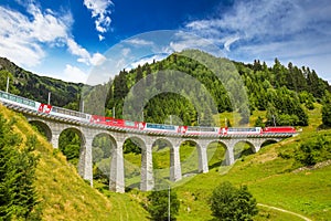 Train on famous landwasser Viaduct bridge, Switzerland