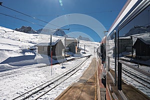 The train of Gonergratbahn running to the Gornergrat station and Stellarium Observatory