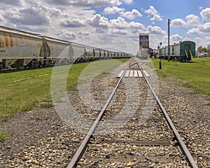 Train and Grain Elevator in Big Valley