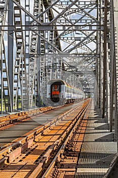 Train on the historic railway bridge in Tczew, Poland