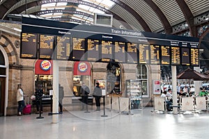 Train Information display showing train times, arivals and departures in old railways station