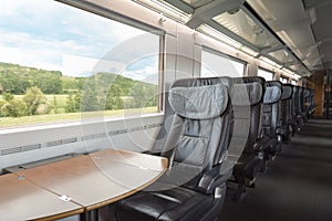 Train interior at first-class on german intercity express. Empty train seats at business class