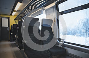 Train interior and winter window view