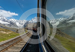 A train journey through a scenic mountain pass, with the gopro mounted on the window. photo