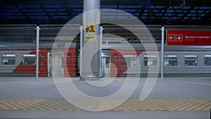 Train leaves empty station platform at airport