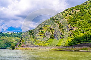 Train is leaving tunnel near Rhein Rhine river in Loreley, Oberwesel, Rhein-Lahn-Kreis, Rhineland-Palatinate, Rheinland-Pfalz,