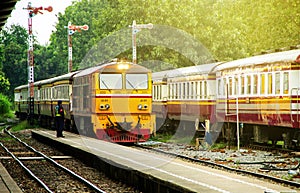 Train led by Diesel Electric locomotives at Railway Station Thailand