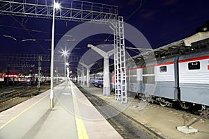 Train on Leningrad railway station at night -- is one of the nine main railway stations of Moscow, Russia