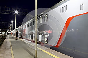 Train on Leningrad railway station at night -- is one of the nine main railway stations of Moscow, Russia