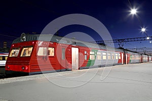 Train on Leningrad railway station at night -- is one of the nine main railway stations of Moscow, Russia