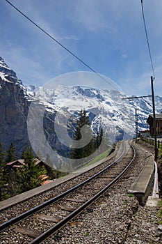 Train line running through the Swiss Alps