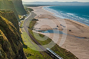 Train between Londonderry and Coleraine, one of the most beautiful rail journeys in the world.