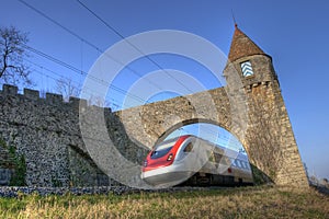 Train through medieval gate