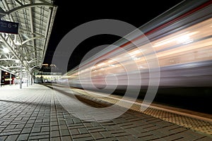 Train on Moscow passenger platform at night (Belorussky railway station) is one of the nine main railway stations in Moscow