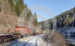 Train. Mountains. Rusty. Snow. Winter. Forest