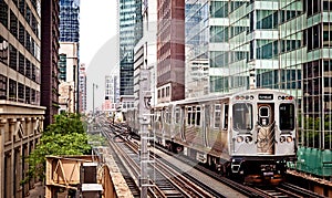 Train moving on the tracks in Chicago photo