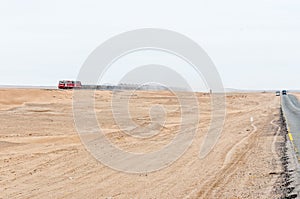 Train next to road C14 between Swakopmund and Walvis bay