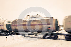 Train with oil tanks moving.