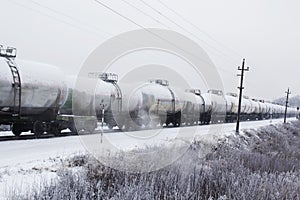 Train with oil tanks moving. Transportation of fuel on the railroad