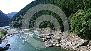 Train over river bridge