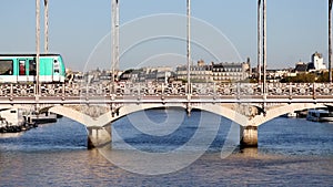 Train of Parisian subway (line 5) passing on Austerlitz viaduct over the river Seine in Paris