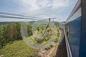 Train passes hills and jungle at the Hai Van Pass between Hue and Da Nang in Central Vietnam