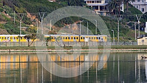 Train passing Sandvlei Estuary