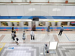 Train passing subway station