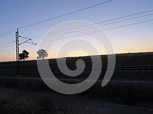 Train path sunset electric sky sunset horizon photo